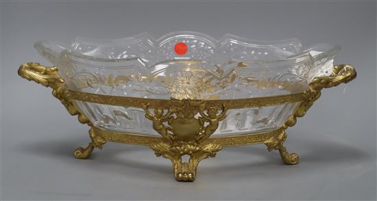 A cut glass bowl on ormolu stand, overall length 42cm